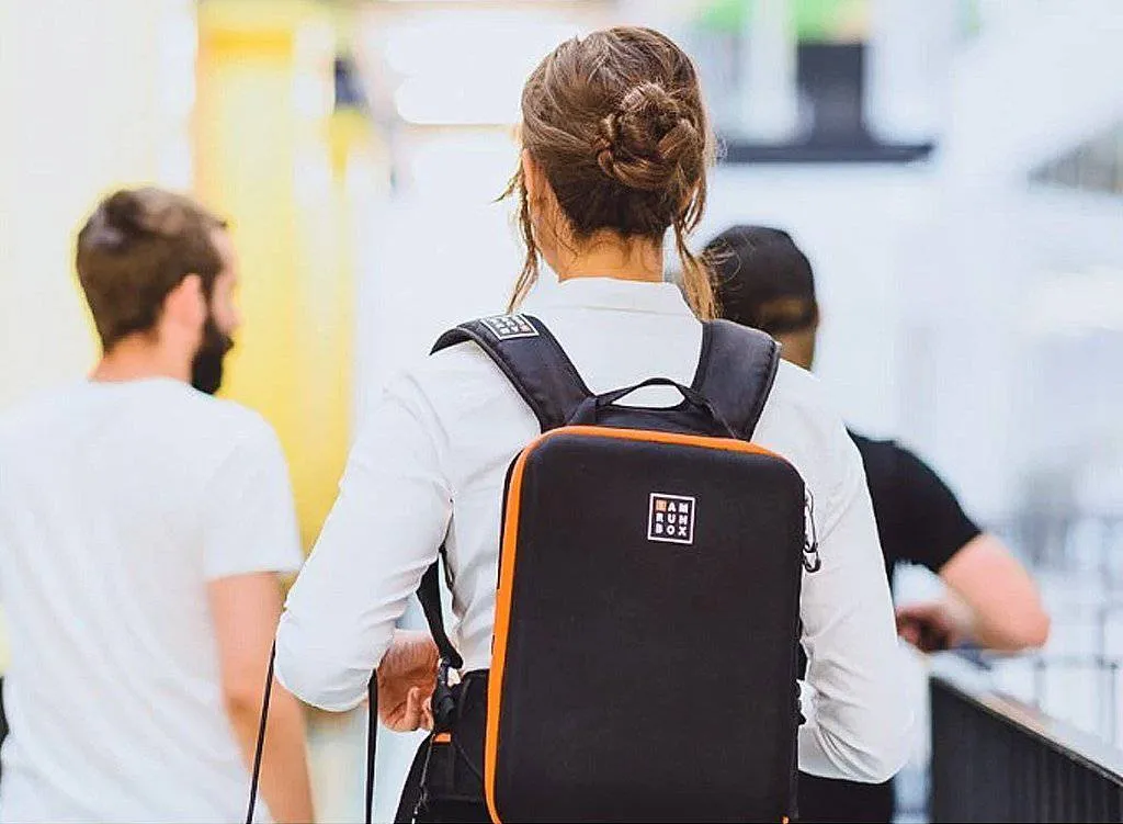IAMRUNBOX - Backpack Lite, Water Resistant, Fits Laptop for Commuting, Lightweight for Running/Cycling, Black with Orange Trim